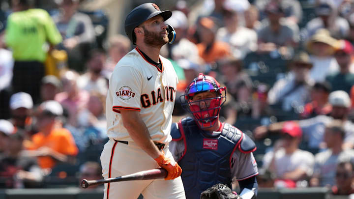 Aug 10, 2025; San Francisco, California; San Francisco Giants second baseman Casey Schmitt (10) walks to the dugout after striking out against the Washington Nationals during the seventh inning at Oracle Park. 