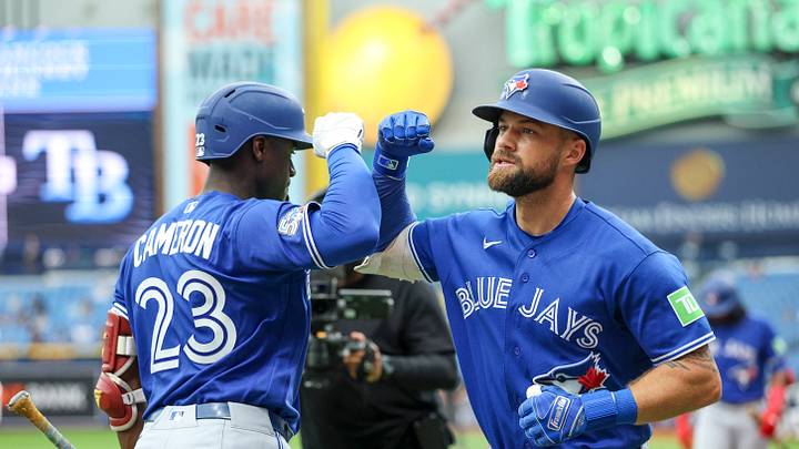 Aug 20, 2026; St. Petersburg, Florida, USA; Toronto Blue Jays left fielder Daz Cameron (23) reacts to a home run by Toronto Blue Jays right fielder Nathan Lukes (38) in the fifth inning at Tropicana Field. Mandatory Credit: Nathan Ray Seebeck-Imagn Images