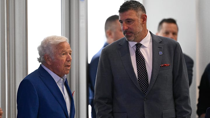 New England Patriots owner Robert Kraft (left) and Mike Vrabel (right) wait for the start of a press conference at Gillette Stadium where Vrabel was introduced as the New England Patriots head coach.