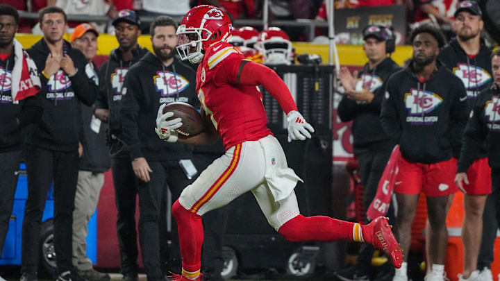 Oct 7, 2024; Kansas City, Missouri, USA; Kansas City Chiefs wide receiver JuJu Smith-Schuster (9) runs the ball against the New Orleans Saints during the first half at GEHA Field at Arrowhead Stadium. Mandatory Credit: Denny Medley-Imagn Images