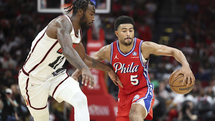 Mar 17, 2025; Houston, Texas, USA; Houston Rockets forward Tari Eason (17) defends against Philadelphia 76ers guard Quentin Grimes (5) during the third quarter at Toyota Center. Mandatory Credit: Troy Taormina-Imagn Images