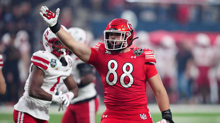 Utah tight end Dallen Bentley gestures after a first down during the first half.