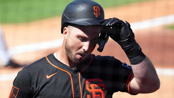 Mar 11, 2024; Surprise, Arizona, USA; San Francisco Giants designated hitter Joey Bart (21) reacts