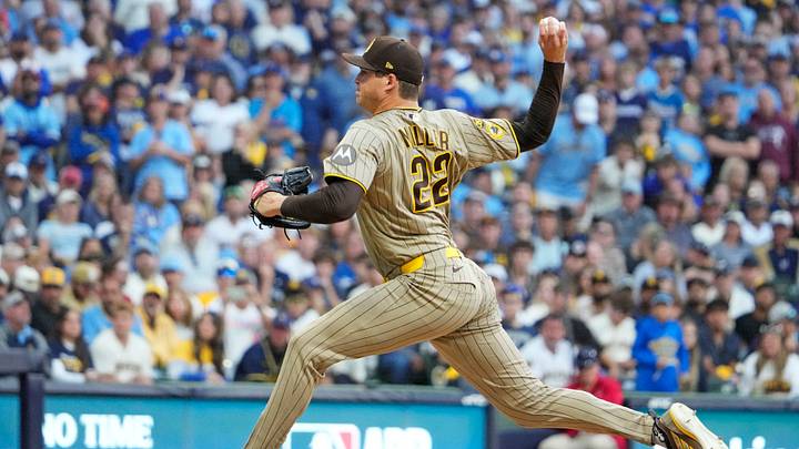 Oct 4, 2026; Milwaukee, Wisconsin, USA; San Diego Padres pitcher Mason Miller (22) throws a pitch during the eighth inning against the Milwaukee Brewers in game two of the NLDS for the 2026 MLB Playoffs at American Family Field. Mandatory Credit: Michael McLoone-Imagn Images Oct 4, 2026; Milwaukee, Wisconsin, USA; San Diego Padres pitcher Mason Miller (22) throws a pitch during the eighth inning against the Milwaukee Brewers in game two of the NLDS for the 2026 MLB Playoffs at American Family Field. Mandatory Credit: Michael McLoone-Imagn Images