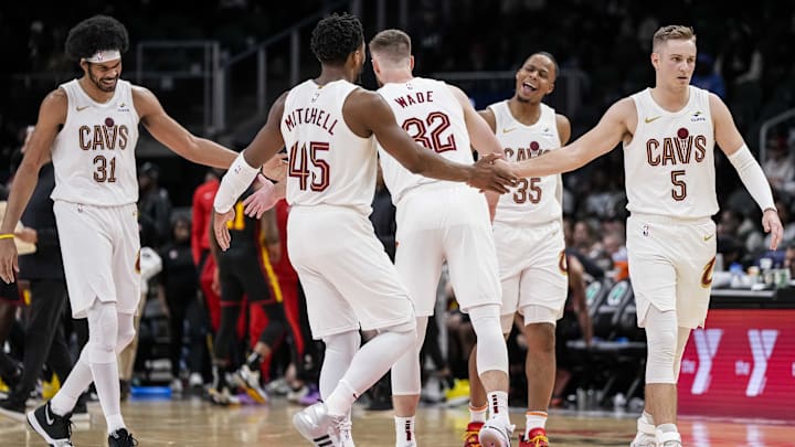 Jan 20, 2024; Atlanta, Georgia, USA; Cleveland Cavaliers players react during a timeout against the Atlanta Hawks during the second half at State Farm Arena. Mandatory Credit: Dale Zanine-Imagn Images
