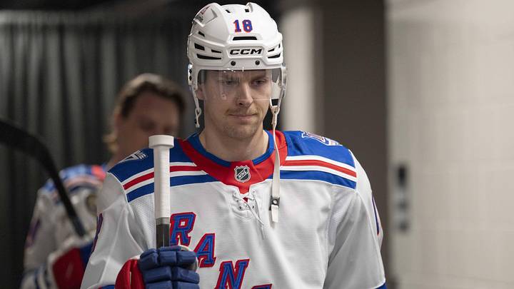 Jan 23, 2026; San Jose, California, USA;  New York Rangers defenseman Urho Vaakanainen (18) before the start of warm ups against the San Jose Sharks at SAP Center at San Jose.