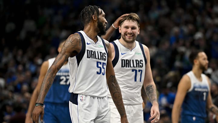 Jan 7, 2024; Dallas, Texas, USA; Dallas Mavericks forward Derrick Jones Jr. (55) and guard Kyrie