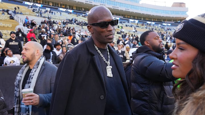 Nov 16, 2024; Boulder, Colorado, USA; Retired American football player Chad Johnson on the sidelines before the game between the Utah Utes against the Colorado Buffaloes at Folsom Field. Mandatory Credit: Ron Chenoy-Imagn Images
