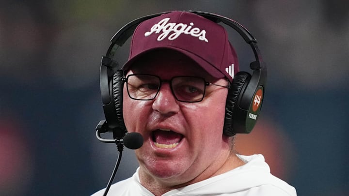 Dec 27, 2024; Las Vegas, NV, USA; Texas A&M Aggies head coach Mike Elko reacts against the Southern California Trojans in the second half at Allegiant Stadium. Mandatory Credit: Kirby Lee-Imagn Images Dec 27, 2024; Las Vegas, NV, USA; Texas A&M Aggies head coach Mike Elko reacts against the Southern California Trojans in the second half at Allegiant Stadium. Mandatory Credit: Kirby Lee-Imagn Images