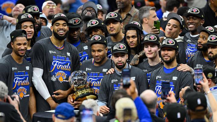 May 25, 2026; Cleveland, Ohio, USA; New York Knicks pose with the 2026 Eastern Conference trophy after defeating the Cleveland Cavaliers in game four of the eastern conference finals for the 2026 NBA playoffs at Rocket Arena. Mandatory Credit: David Richard-Imagn Images May 25, 2026; Cleveland, Ohio, USA; New York Knicks pose with the 2026 Eastern Conference trophy after defeating the Cleveland Cavaliers in game four of the eastern conference finals for the 2026 NBA playoffs at Rocket Arena. Mandatory Credit: David Richard-Imagn Images