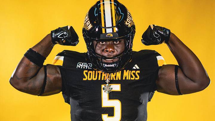 Southern Miss defensive lineman Nasim Cairo (#5) poses during a Golden Eagles' preseason photoshoot. Southern Miss defensive lineman Nasim Cairo (#5) poses during a Golden Eagles' preseason photoshoot.