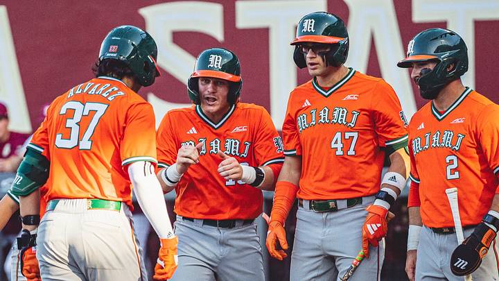 MIami Hurricanes players after Alonzo Alveraz hits a home run MIami Hurricanes players after Alonzo Alveraz hits a home run