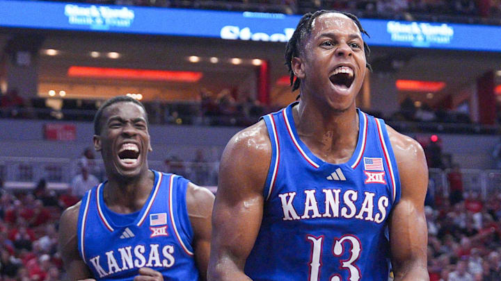 Kansas Jayhawks guard Elmarko Jackson (13) and Kansas Jayhawks guard Melvin Council Jr. (14) react in the second half during the Jayhawks' 90-82 win over the Louisville Cardinals in an exhibition basketball game at the KFC Yum! Center in Louisville, Kentucky Friday, October 24, 2025. Kansas Jayhawks guard Elmarko Jackson (13) and Kansas Jayhawks guard Melvin Council Jr. (14) react in the second half during the Jayhawks' 90-82 win over the Louisville Cardinals in an exhibition basketball game at the KFC Yum! Center in Louisville, Kentucky Friday, October 24, 2025.