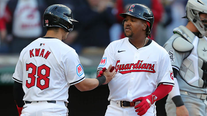 Cleveland Guardians' Jose Ramirez (11) celebrates with teammate Steven Kwan (38) at home after his two-run home run during the Guardians' home opener against the Chicago White Sox on April 8, 2024, in Cleveland, Ohio.