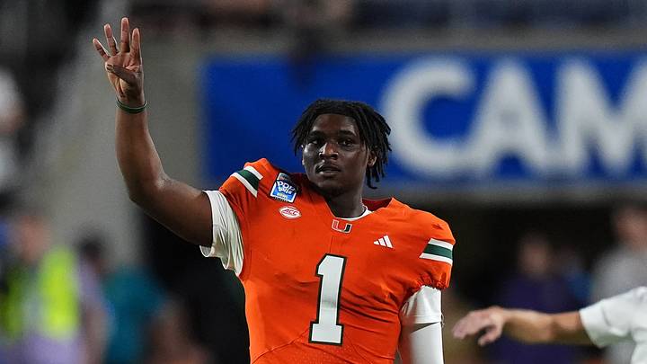 Dec 28, 2024; Orlando, FL, USA; Miami Hurricanes quarterback Cam Ward (1) gestures during the second half against the Iowa State Cyclones  at Camping World Stadium. Mandatory Credit: Jasen Vinlove-Imagn Images