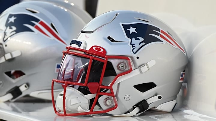 Aug 19, 2022; Foxborough, Massachusetts, USA; A Patriots helmet sits on the bench before the first half of a preseason game against the Carolina Panthers at Gillette Stadium. Mandatory Credit: Eric Canha-Imagn Images
