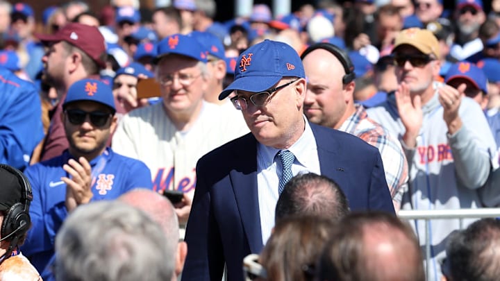 Fans cheer as Mets owner Steve Cohen makes his way through the crowd prior to the unveiling of the