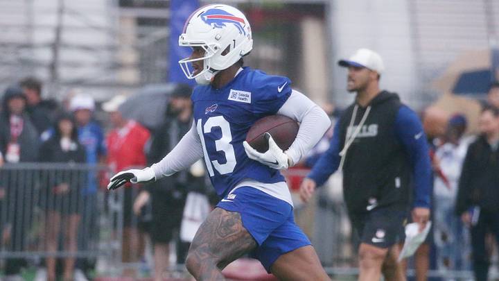 Buffalo Bills WR Skyler Bell turns up the field after a catch across them middle during the opening day of training camp at St. John Fisher University. Buffalo Bills WR Skyler Bell turns up the field after a catch across them middle during the opening day of training camp at St. John Fisher University.