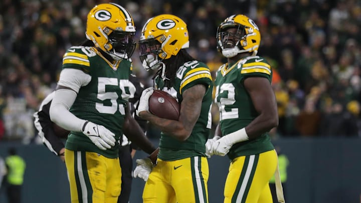 Green Bay Packers cornerback Kevin King (20), center, celebrates an interception in the end zone with Green Bay Packers inside linebacker De'Vondre Campbell (59) and Green Bay Packers inside linebacker Oren Burks (42)  during the second half of the 17-0 win at Lambeau Field in Green Bay on Sunday, Nov. 14, 2021.   Photo by Mike De Sisti / Milwaukee Journal Sentinel via USA TODAY NETWORK