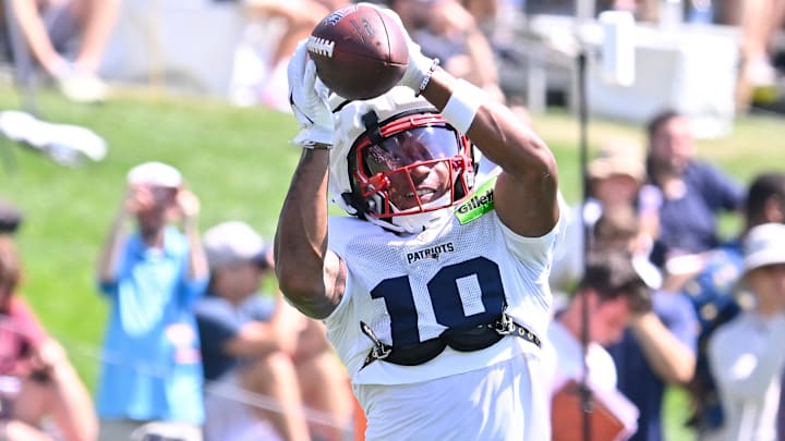 Jul 28, 2025; Foxborough, MA, USA; New England Patriots wide receiver Kyle Williams (18) makes a catch during training camp at Gillette Stadium. Mandatory Credit: Eric Canha-Imagn Images