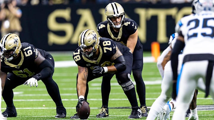 New Orleans Saints quarterback Derek Carr (4) calls for the ball from center Erik McCoy (78) against the Carolina Panthers New Orleans Saints quarterback Derek Carr (4) calls for the ball from center Erik McCoy (78) against the Carolina Panthers