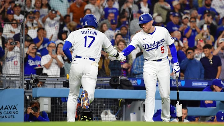 May 19, 2025; Los Angeles, California, USA; Los Angeles Dodgers designated hitter Shohei Ohtani (17) is greeted by first baseman Freddie Freeman (5) after hitting a solo home run against the Arizona Diamondbacks during the sixth inning at Dodger Stadium. Mandatory Credit: Gary A. Vasquez-Imagn Images May 19, 2025; Los Angeles, California, USA; Los Angeles Dodgers designated hitter Shohei Ohtani (17) is greeted by first baseman Freddie Freeman (5) after hitting a solo home run against the Arizona Diamondbacks during the sixth inning at Dodger Stadium. Mandatory Credit: Gary A. Vasquez-Imagn Images