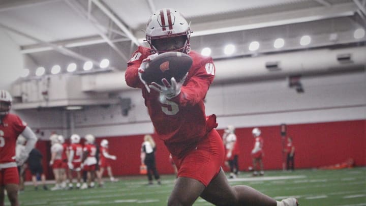 Wisconsin receiver Quincy Burroughs makes a sideline catch during the team's 14th spring practice, which was held Tuesday morning April 30, 2024 at the McClain Center in Madison, Wisconsin.
