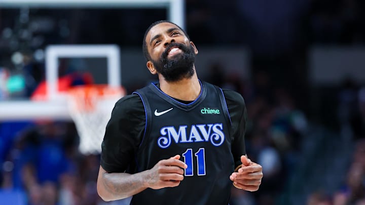 Mar 21, 2024; Dallas, Texas, USA;  Dallas Mavericks guard Kyrie Irving (11) reacts after scoring during the second half against the Utah Jazz at American Airlines Center. Mandatory Credit: Kevin Jairaj-Imagn Images