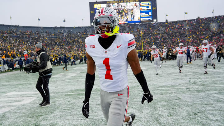 Ohio State Buckeyes cornerback Davison Igbinosun (1) celebrates after defeating the Michigan Wolverines in the NCAA football game at Michigan Stadium on Saturday, Nov. 29, 2025 in Ann Arbor, Michigan.