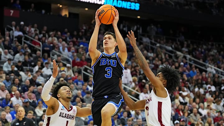 Mar 27, 2025; Newark, NJ, USA; Brigham Young Cougars guard Egor Demin (3) drives to the basket against Alabama Crimson Tide guard Mark Sears (1) during the second half during an East Regional semifinal of the 2025 NCAA tournament at Prudential Center.