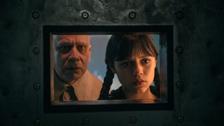 Wednesday. (L to R) Fred Armisen as Uncle Fester, Jenna Ortega as Wednesday Addams in episode 204 of Wednesday