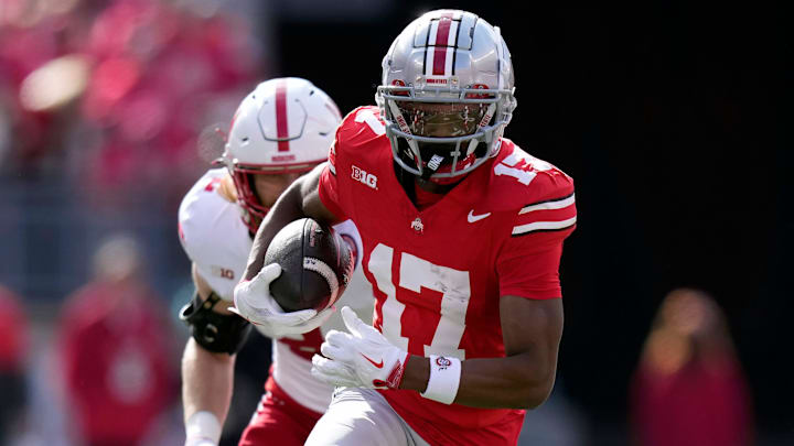 Ohio State Buckeyes wide receiver Carnell Tate (17) heads up field against Nebraska Cornhuskers after a catch during the first quarter of their game at Ohio Stadium on Oct 26, 2024, in Columbus.