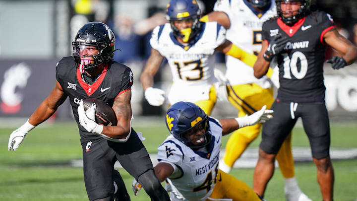 Cincinnati Bearcats running back Evan Pryor (6) runs down the field with the ball in the fourth quarter of a college football game between the Cincinnati Bearcats and West Virginia Mountaineers, Saturday, Nov. 9, 2024, at Nippert Stadium in Cincinnati. Mountaineers won 31-24.