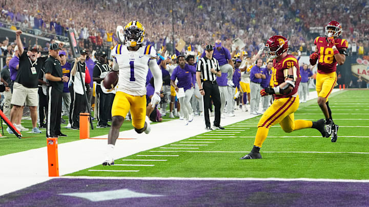 Sep 1, 2024; Paradise, Nevada, USA; LSU Tigers wide receiver Aaron Anderson (1) scores a touchdown against the Southern California Trojans during the third quarter at Allegiant Stadium. Mandatory Credit: Stephen R. Sylvanie-USA TODAY Sports