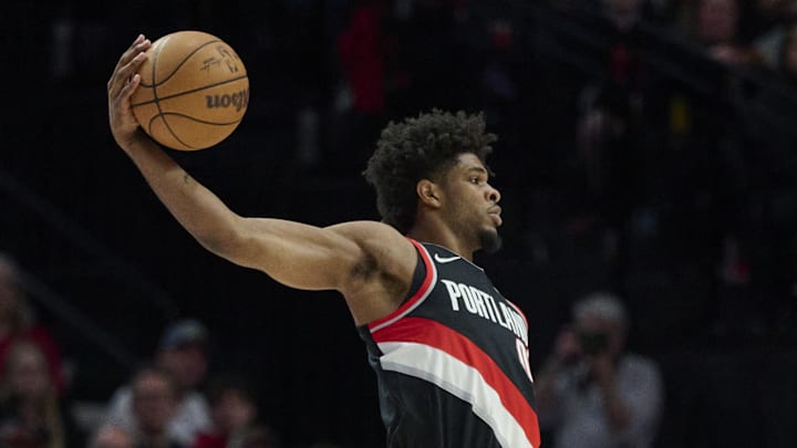 Mar 19, 2025; Portland, Oregon, USA; Portland Trail Blazers guard Scoot Henderson (00) catches a pass during the first half against the Memphis Grizzlies at Moda Center. Mandatory Credit: Troy Wayrynen-Imagn Images