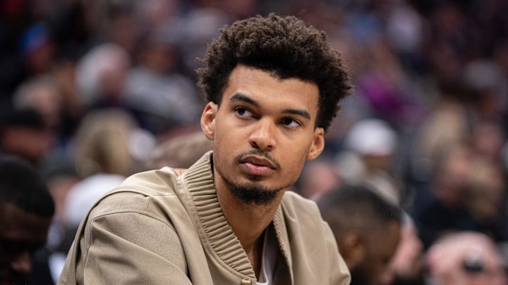 Mar 7, 2025; Sacramento, California, USA; San Antonio Spurs center Victor Wembanyama (1) looks on from the bench during the fourth quarter of the game against the Sacramento Kings at Golden 1 Center. Mandatory Credit: Ed Szczepanski-Imagn Images
