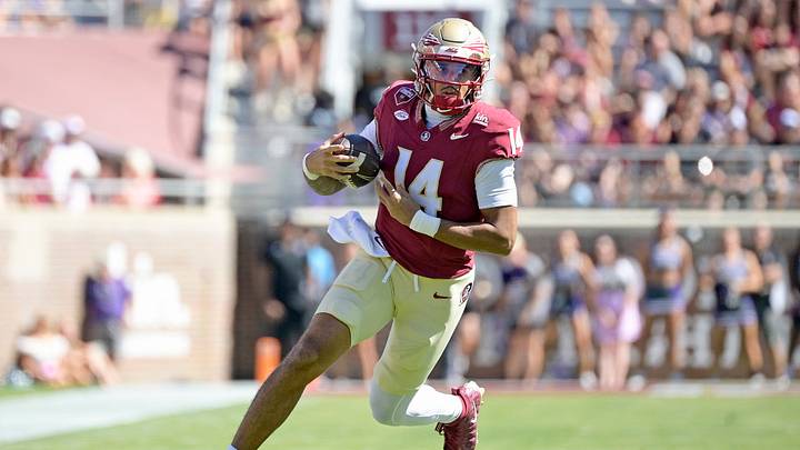 Sep 26, 2026; Tallahassee, Florida, USA;  Florida State Seminoles quarterback Ashton Daniels (14) runs during the first quarter against the Central Arkansas Bears at Doak S. Campbell Stadium.  Mandatory Credit: Melina Myers-Imagn Images