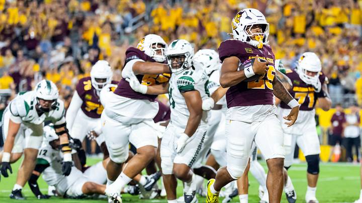 Oct 10, 2026; Tempe, Arizona, USA; Arizona State Sun Devils running back Cardae Mack (25) scores a touchdown against the Hawaii Rainbow Warriors in the first half at Mountain America Stadium. Mandatory Credit: Mark J. Rebilas-Imagn Images Oct 10, 2026; Tempe, Arizona, USA; Arizona State Sun Devils running back Cardae Mack (25) scores a touchdown against the Hawaii Rainbow Warriors in the first half at Mountain America Stadium. Mandatory Credit: Mark J. Rebilas-Imagn Images