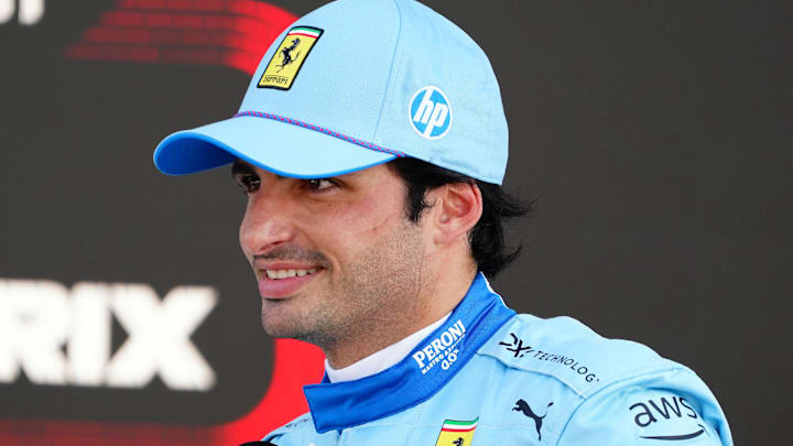 May 4, 2024; Miami Gardens, Florida, USA; Ferrari driver Carlos Sainz (55) talks to the media in the paddock after qualifying P3 for the Miami Grand Prix at Miami International Autodrome. Mandatory Credit: John David Mercer-USA TODAY Sports
