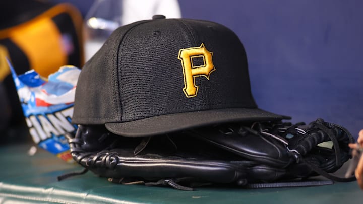 Sep 8, 2023; Atlanta, Georgia, USA; A detailed view of a Pittsburgh Pirates hat and glove before a