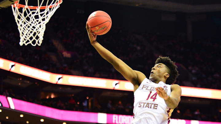 Senior guard Terrance Mann lays one up during the first half of the ACC Tournament Quarterfinal Game at the Spectrum Center in Charlotte on Thursday.

20190314 Dsc 1243