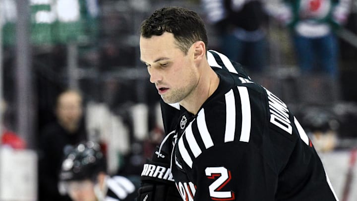Apr 11, 2025; Newark, New Jersey, USA; New Jersey Devils defenseman Brian Dumoulin (2) warms up prior to a game against  the Pittsburgh Penguins at Prudential Center. Mandatory Credit: John Jones-Imagn Images