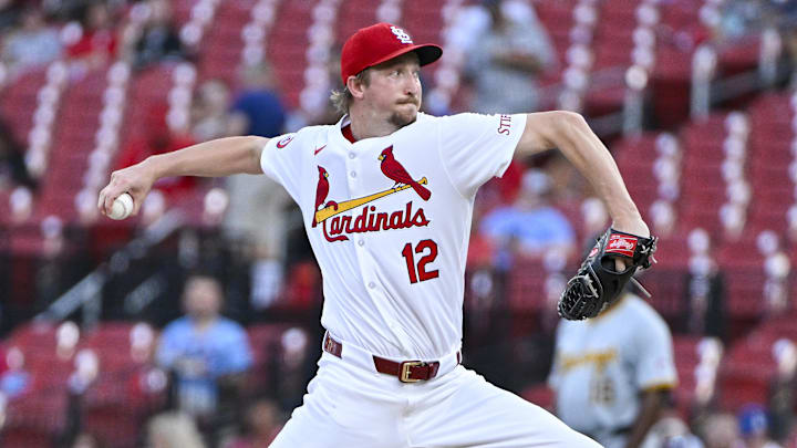 Sep 19, 2024; St. Louis, Missouri, USA;  St. Louis Cardinals starting pitcher Erick Fedde (12) pitches against the Pittsburgh Pirates during the first inning at Busch Stadium. Mandatory Credit: Jeff Curry-Imagn Images