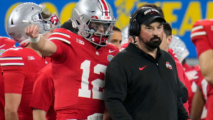 Dec 29, 2023; Arlington, Texas, USA; Ohio State Buckeyes quarterback Lincoln Kienholz (12) talks to