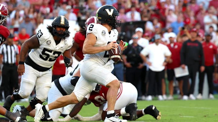 Oct 4, 2025; Tuscaloosa, Alabama, USA; Vanderbilt Commodores quarterback Diego Pavia (2) runs out of the pocket during the second half against the Alabama Crimson Tide at Saban Field at Bryant-Denny Stadium. Mandatory Credit: David Leong-Imagn Images Oct 4, 2025; Tuscaloosa, Alabama, USA; Vanderbilt Commodores quarterback Diego Pavia (2) runs out of the pocket during the second half against the Alabama Crimson Tide at Saban Field at Bryant-Denny Stadium. Mandatory Credit: David Leong-Imagn Images