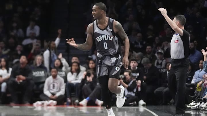 Apr 6, 2025; Brooklyn, New York, USA; Brooklyn Nets forward Dariq Whitehead (0) reacts to making a three point shot against the Toronto Raptors during the first half at Barclays Center. Mandatory Credit: Gregory Fisher-Imagn Images