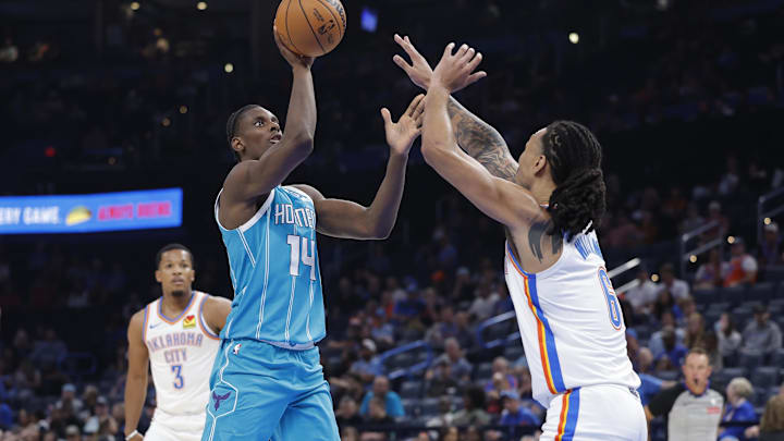 Oct 9, 2025; Oklahoma City, Oklahoma, USA; Charlotte Hornets forward Moussa Diabaté (14) shoots as Oklahoma City Thunder forward Jaylin Williams (6) defends during the second half of a game between the Charlotte Hornets and the Oklahoma City Thunder at Paycom Center. Mandatory Credit: Alonzo Adams-Imagn Images Oct 9, 2025; Oklahoma City, Oklahoma, USA; Charlotte Hornets forward Moussa Diabaté (14) shoots as Oklahoma City Thunder forward Jaylin Williams (6) defends during the second half of a game between the Charlotte Hornets and the Oklahoma City Thunder at Paycom Center. Mandatory Credit: Alonzo Adams-Imagn Images