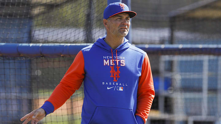 Mar 13, 2022; Port St. Lucie, FL, USA; New York Mets hitting coach Eric Chavez looks on as players take batting practice during spring training. Mandatory Credit: Sam Navarro-Imagn Images Mar 13, 2022; Port St. Lucie, FL, USA; New York Mets hitting coach Eric Chavez looks on as players take batting practice during spring training. Mandatory Credit: Sam Navarro-Imagn Images
