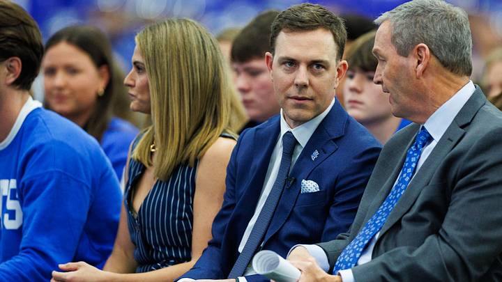 Dec 3, 2025; Lexington, KY, USA; Kentucky Wildcats athletic director Mitch Barnhart talks with head football coach Will Stein during his introductory press conference at Nutter Field House. Mandatory Credit: Jordan Prather-Imagn Images