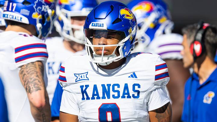 Nov 8, 2025; Tucson, Arizona, USA; Kansas Jayhawks quarterback Isaiah Marshall (8) against the Arizona Wildcats at Arizona Stadium. Mandatory Credit: Mark J. Rebilas-Imagn Images